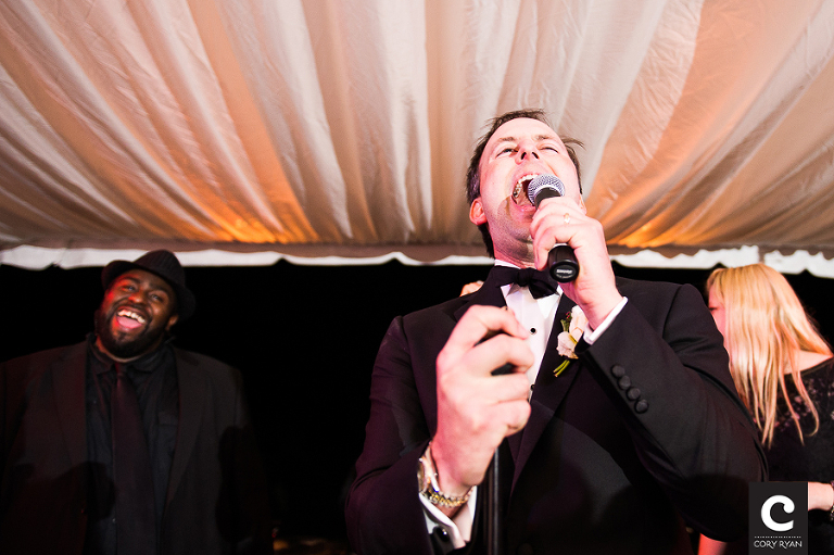 groom sings with band