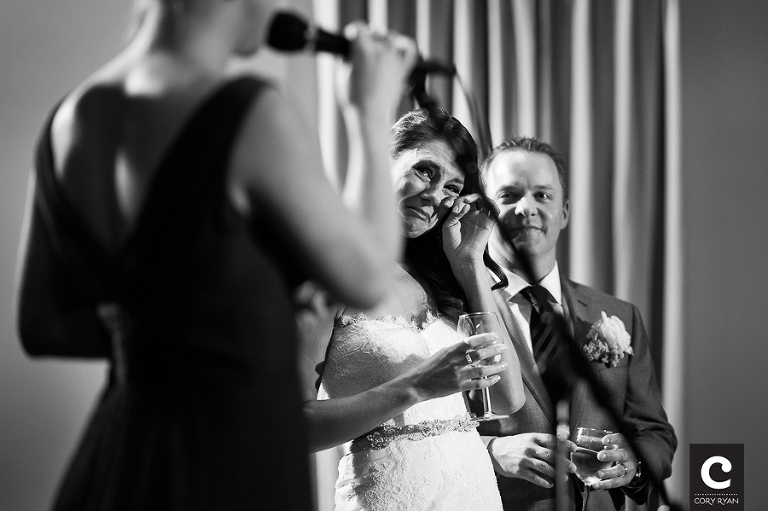 bride cries during toast by maid of honor