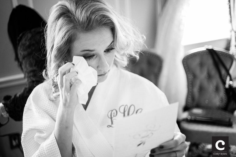 crying bride wiping tears
