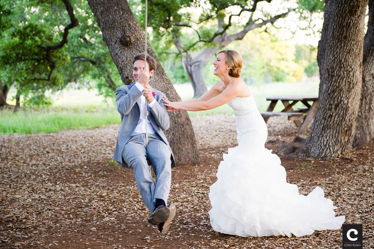 bride and groom on swing