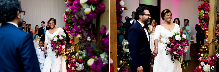 bride and groom under mandap