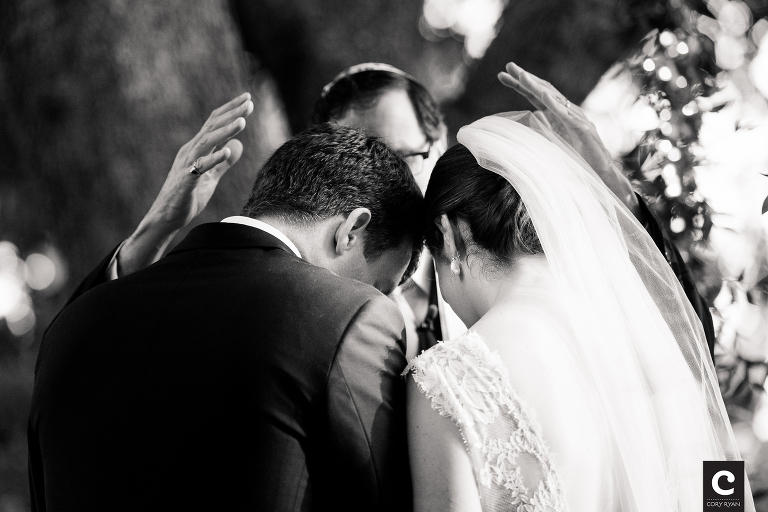 rabbi with bride and groom