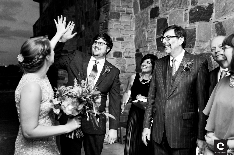 bride and groom high five